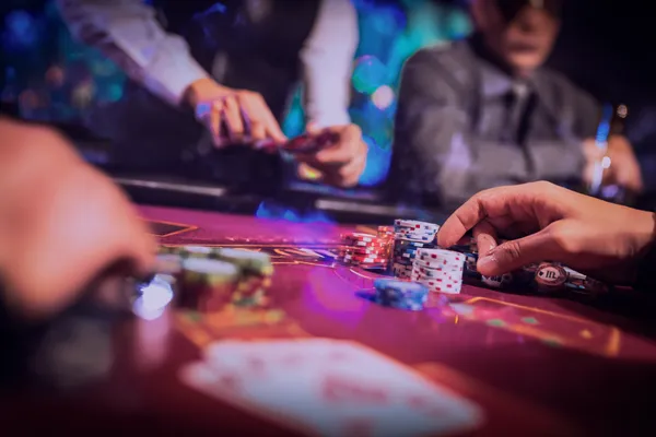 A confident dealer surrounded by casino chips inviting players to access their 86JLPH account, reflecting quick and easy login options.